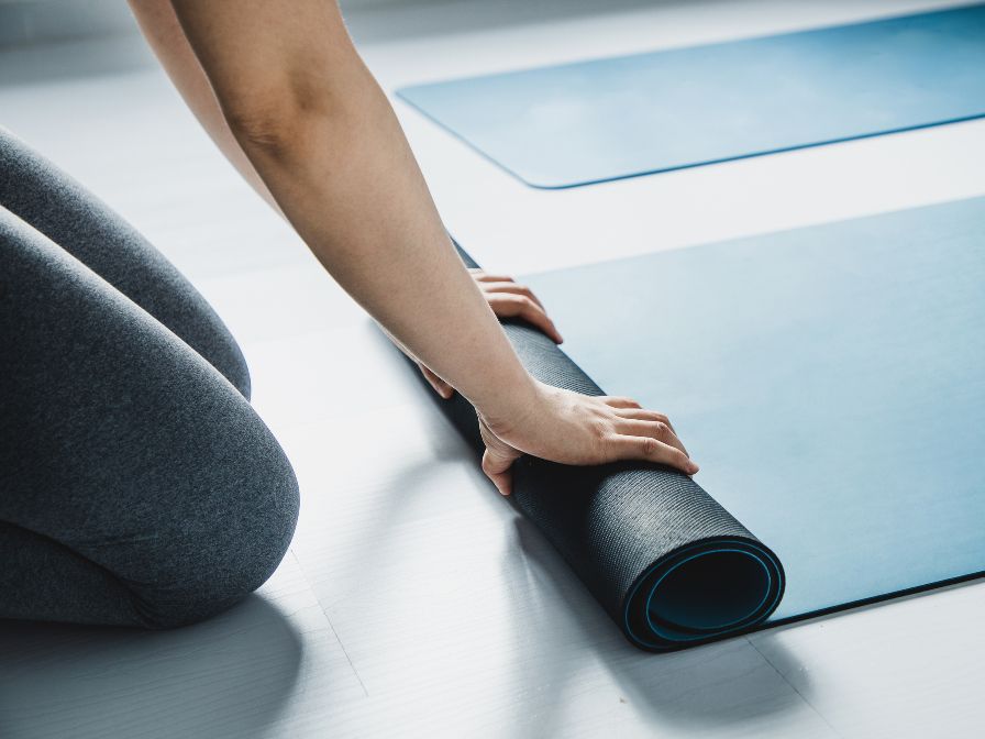 Individual rolling up yoga mat