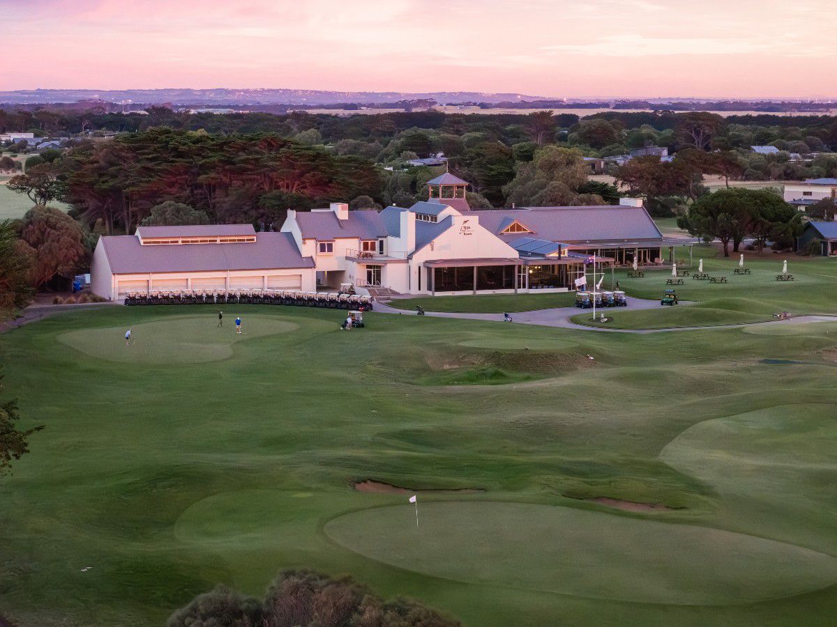 Aerial view of golf course clubhouse and grounds
