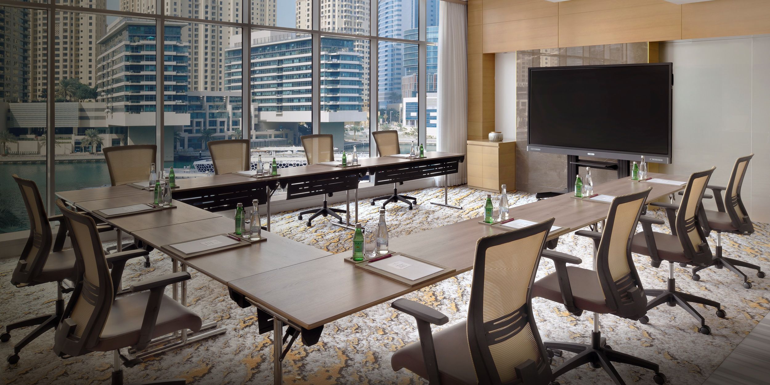 A carousel of IHG hotels with meeting rooms