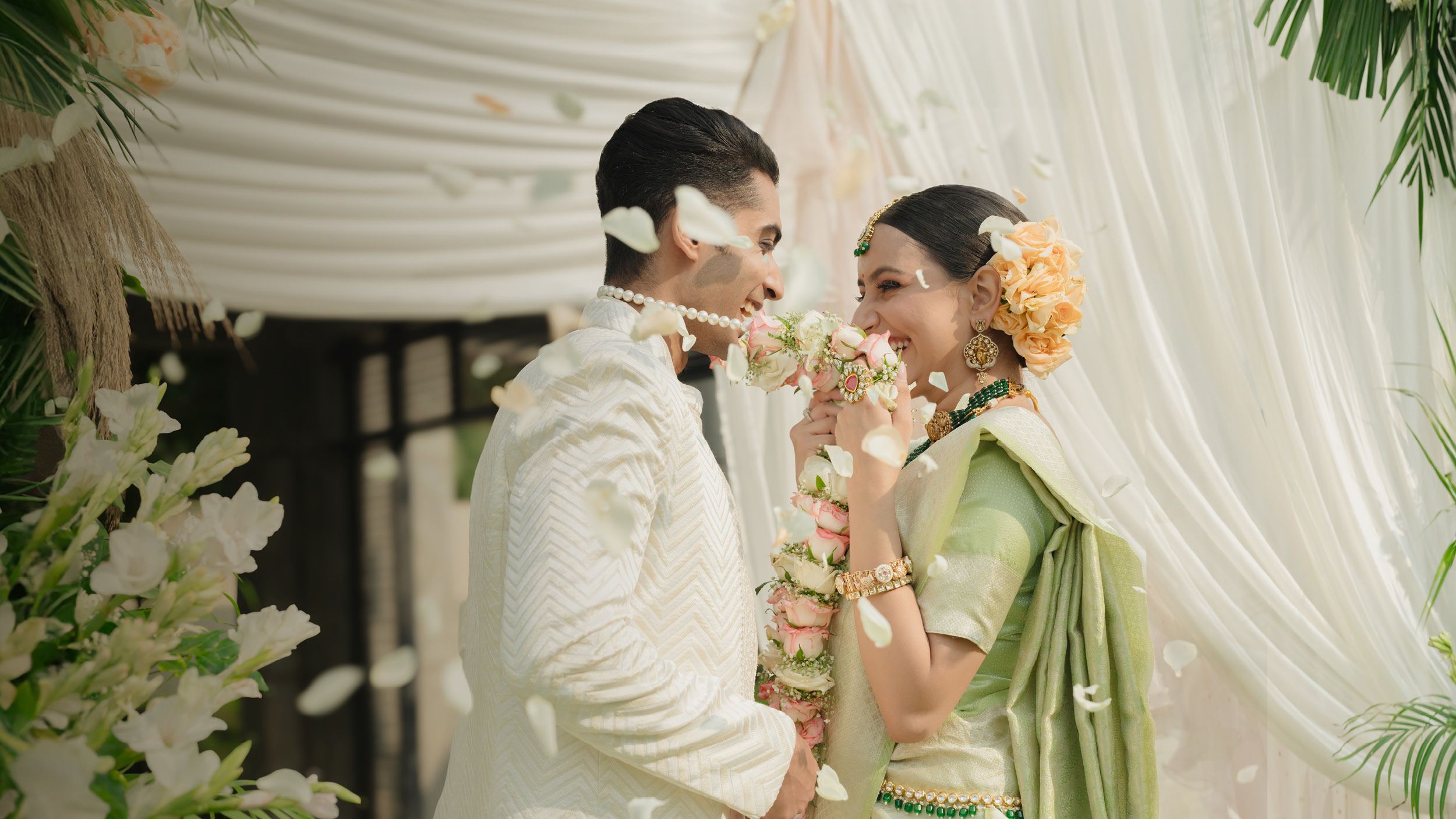 a man and a woman on an Indian wedding