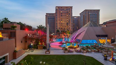 Swimming pool with hotel façade view of InterContinental Citystars Cairo