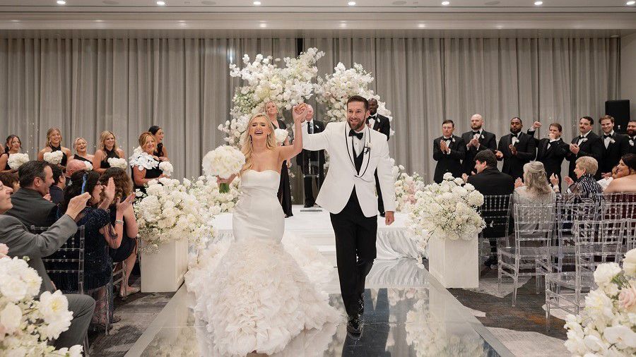 Bride and groom walking down aisle