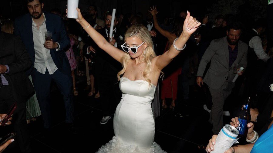 Bride on dancefloor dancing