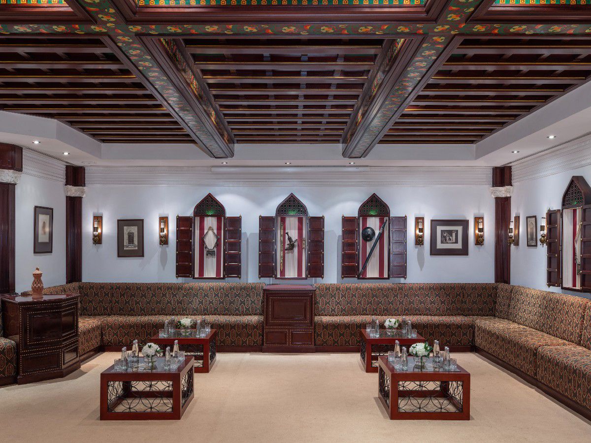 Traditional Al Majlis lounge with ornate furnishings and seating
