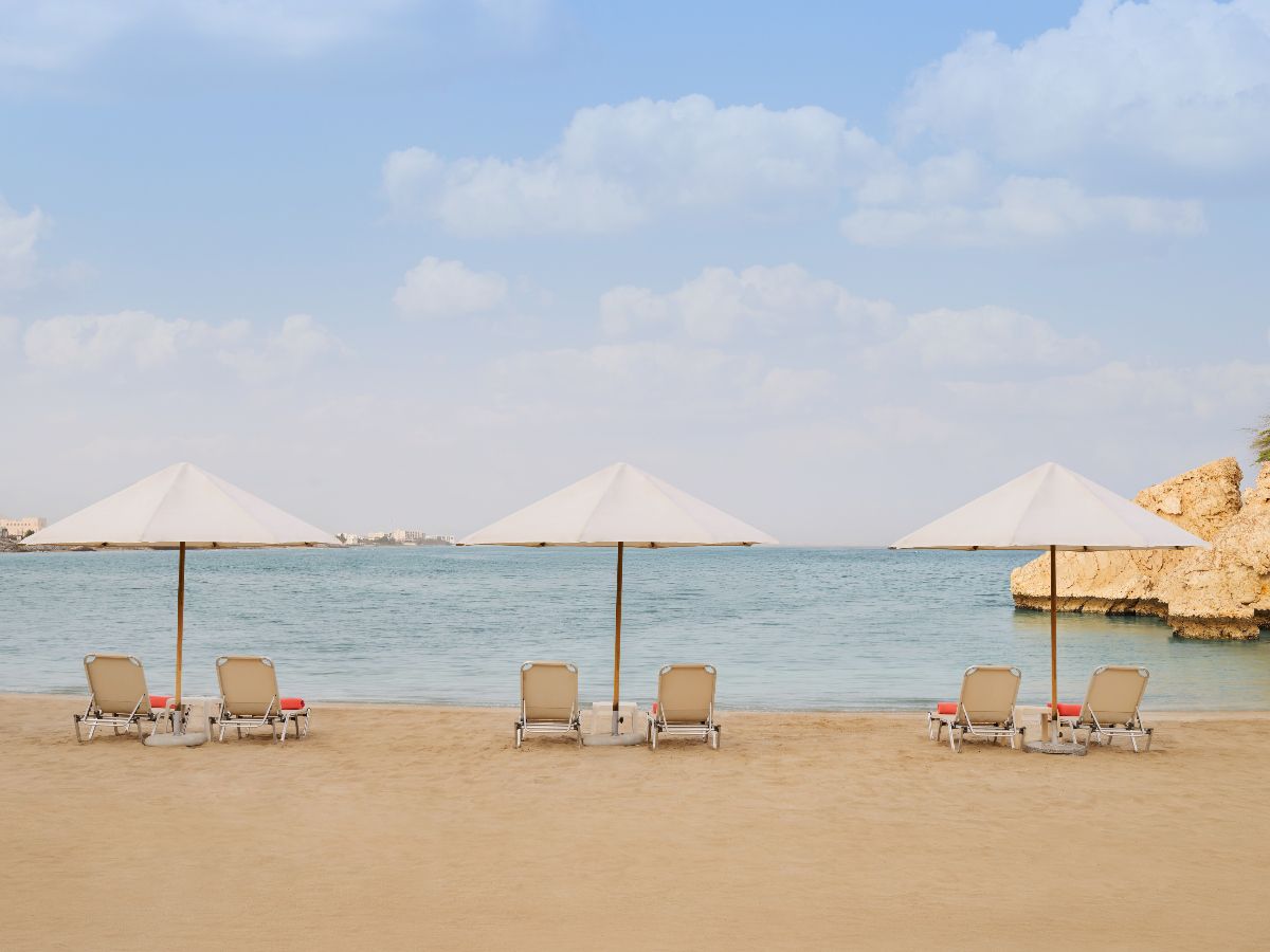 Beachfront loungers with ocean views