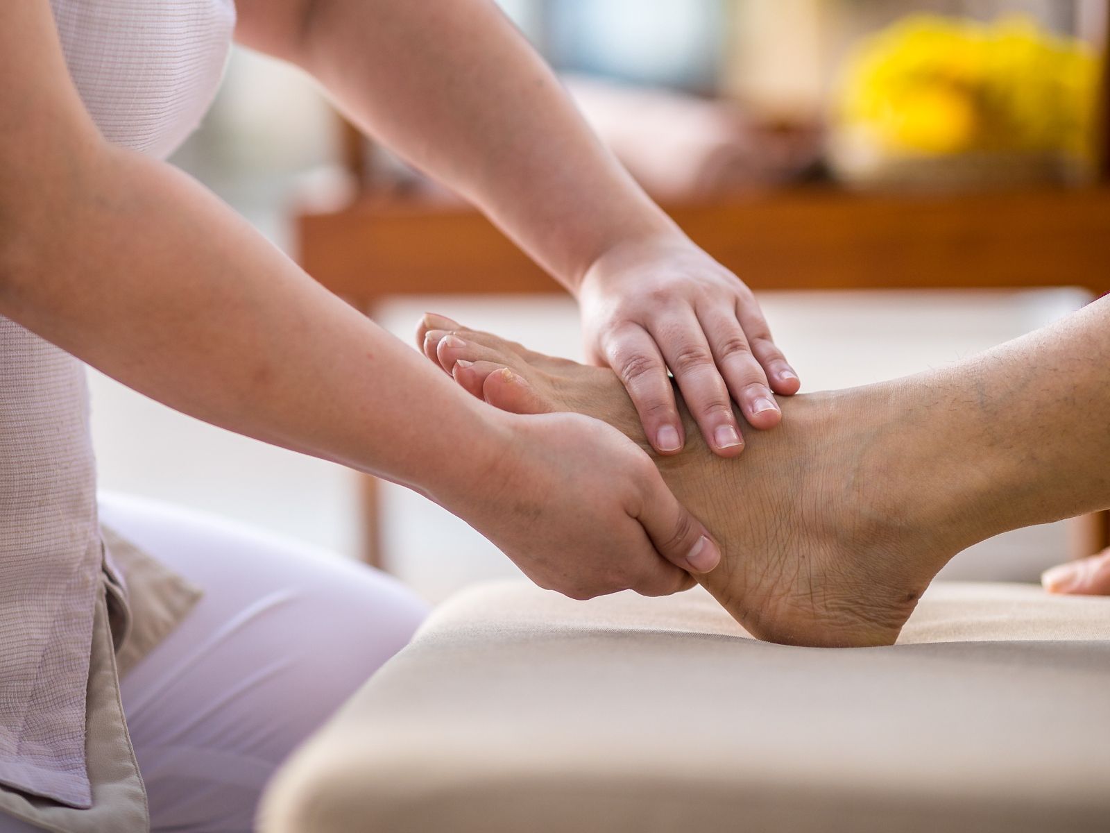 Relaxing foot reflexology therapy session