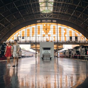 Station interior featuring large arched windows
