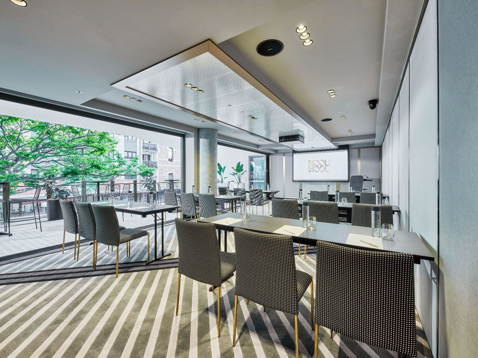A modern and versatile space designed for productive meetings and events.