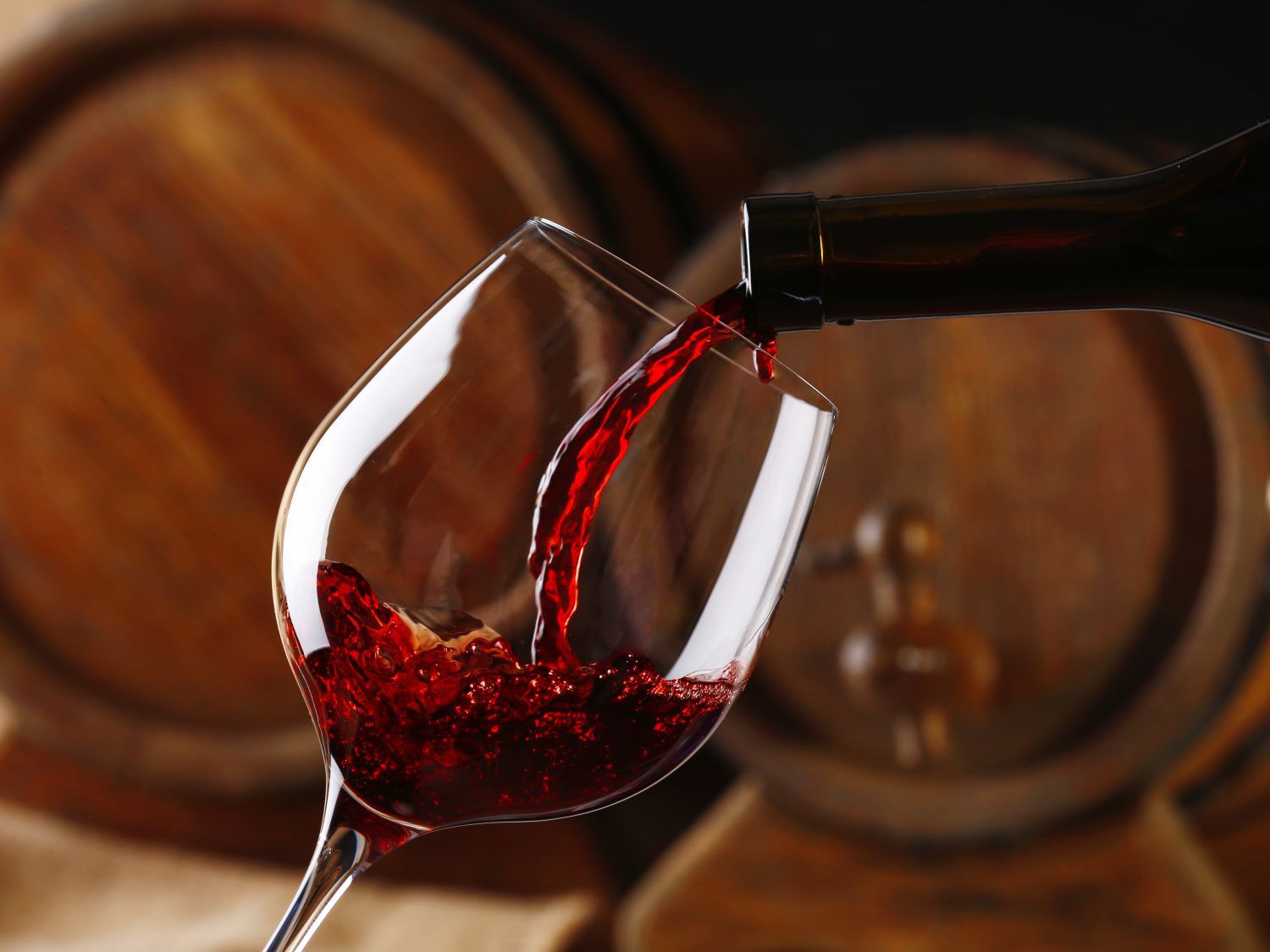 Pouring Beaujolais into a red wine glass