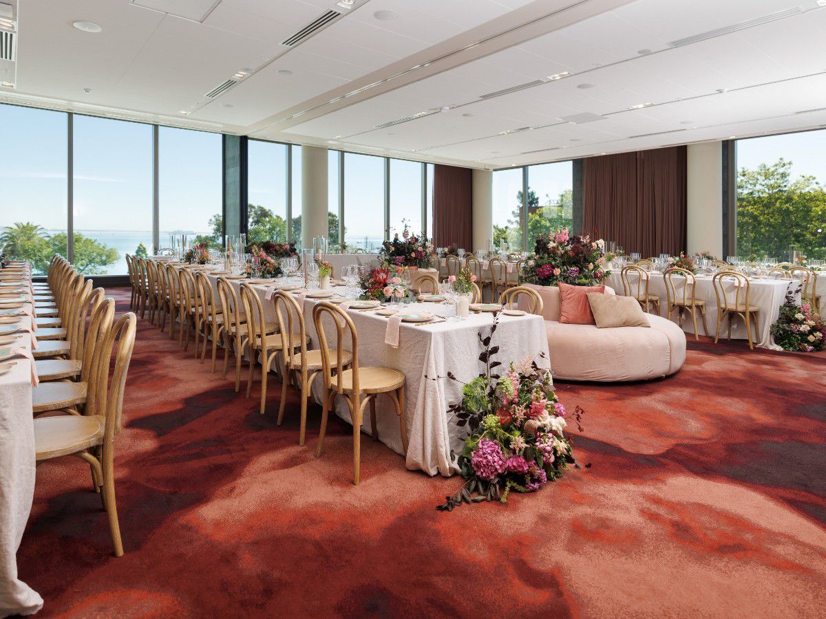 Elegant banquet room decorated for ceremonies.