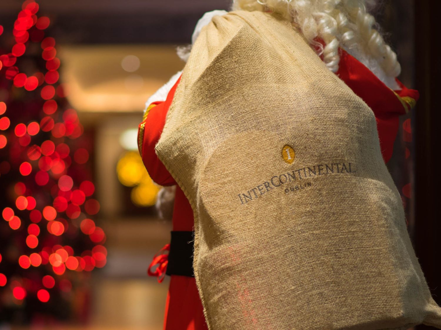 Santa holding a sack of Intercontinental gifts