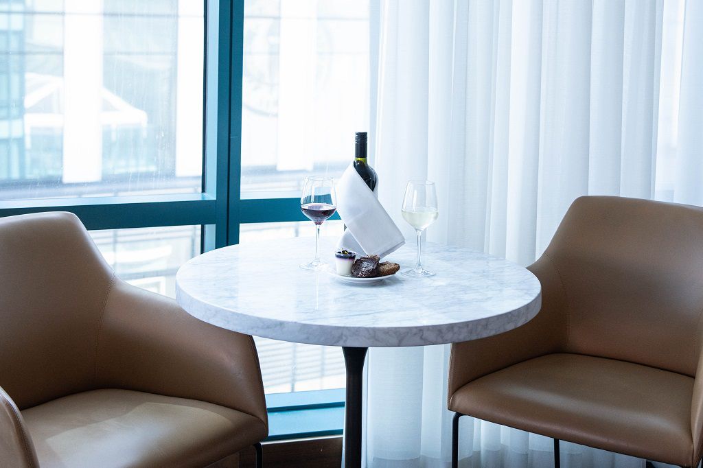 Wine and snacks on table at Club Lounge in InterContinental San Francisco
