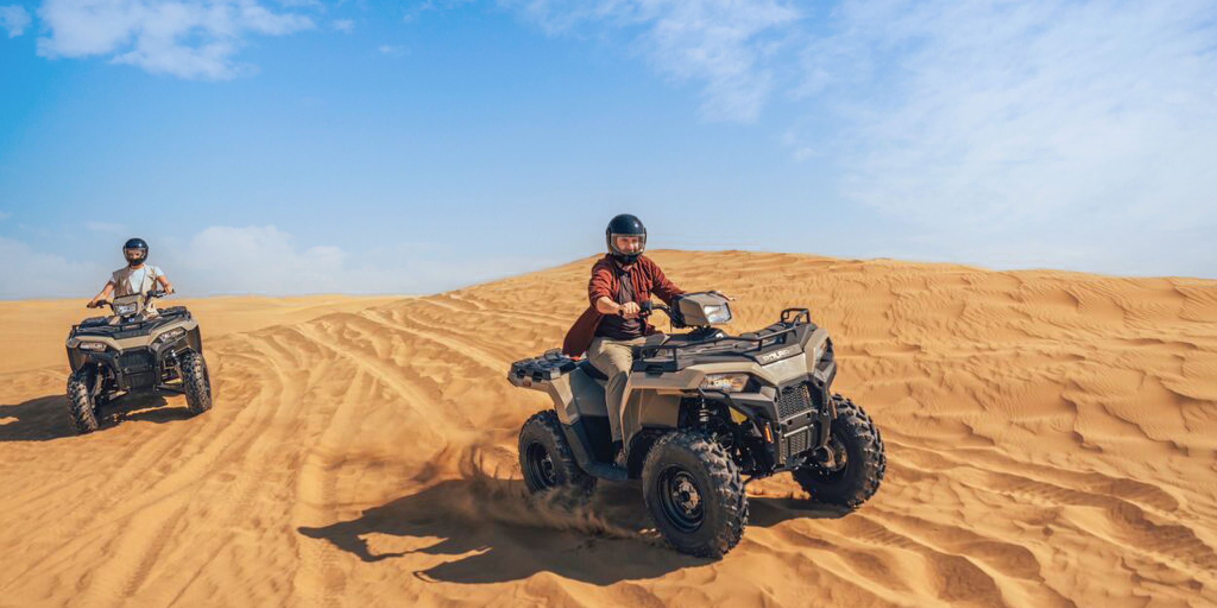 A collection of images to show many experiences in Dubai - the skyline view, sandunes, street shopping