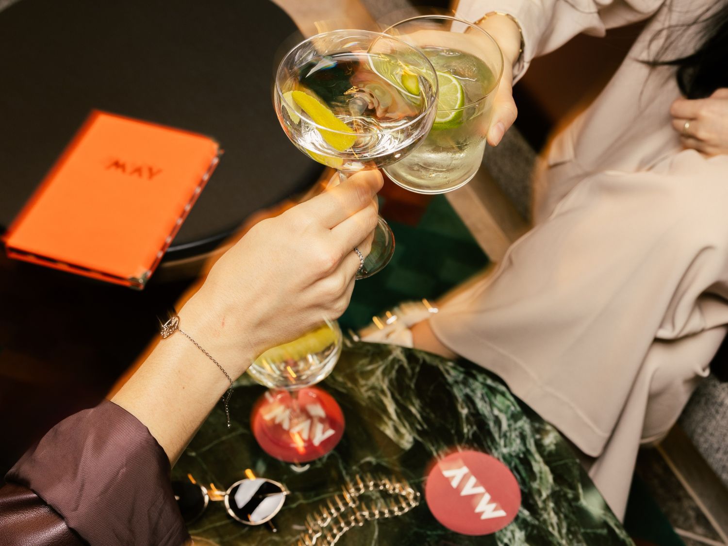 Clinking cocktails at Frankfurt bar