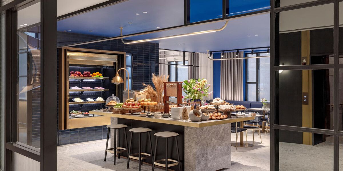 Elegant dining area with buffet and seating.