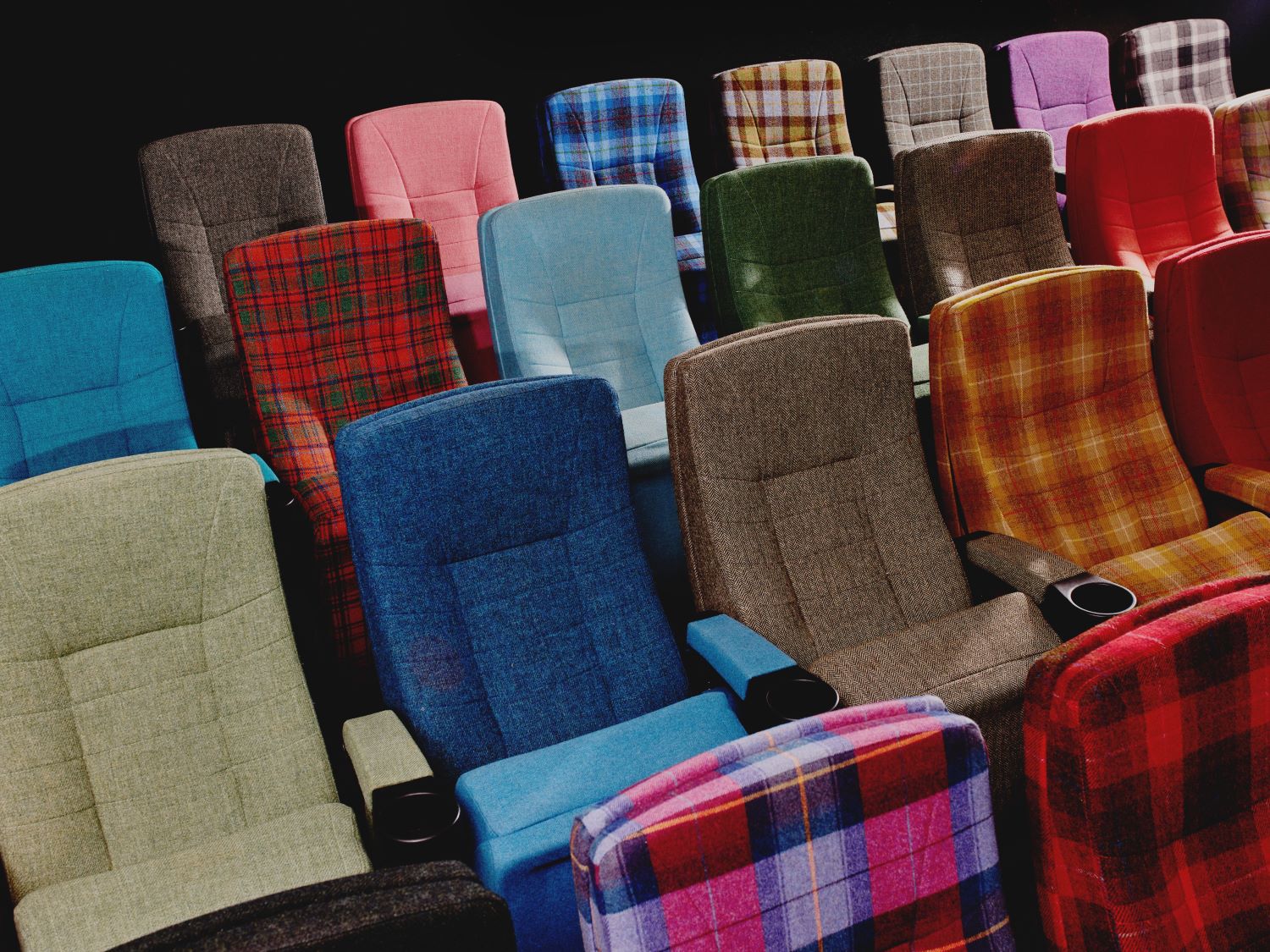 Colourful coloured cinema seats in a theatre