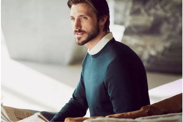 Man sitting and smiling