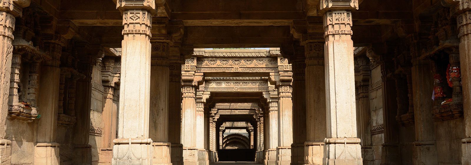 Inside view of a building with repeating columns
