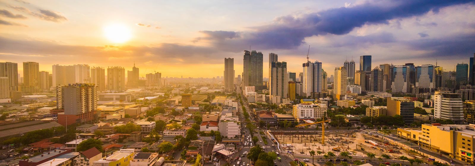 View of city as the sun goes down