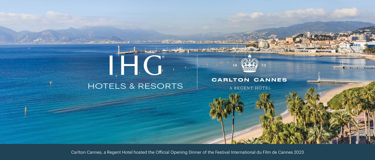 sweeping curved coastline with cannes in the backdrop 