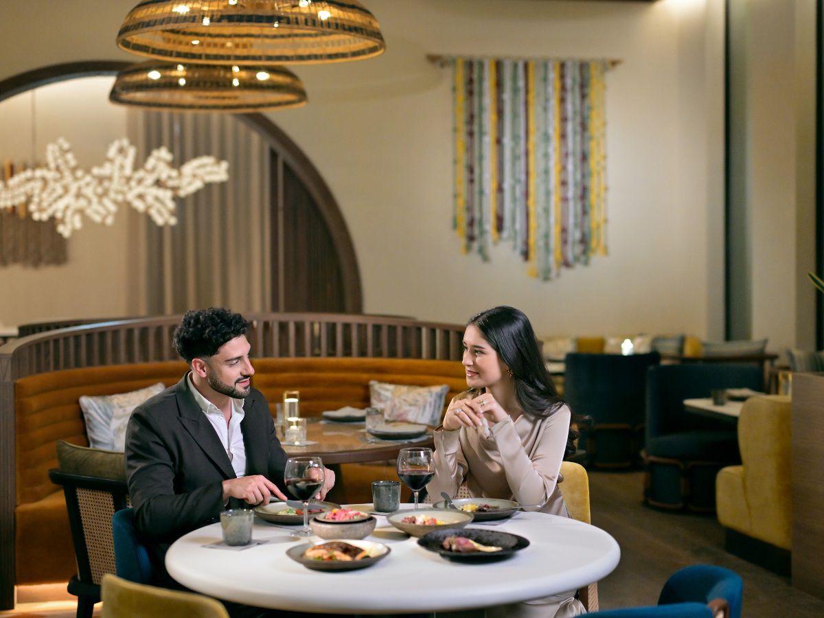 Couple enjoying dinner in elegant restaurant..