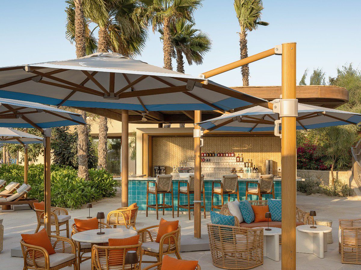 Poolside bar with outdoor lounge seating