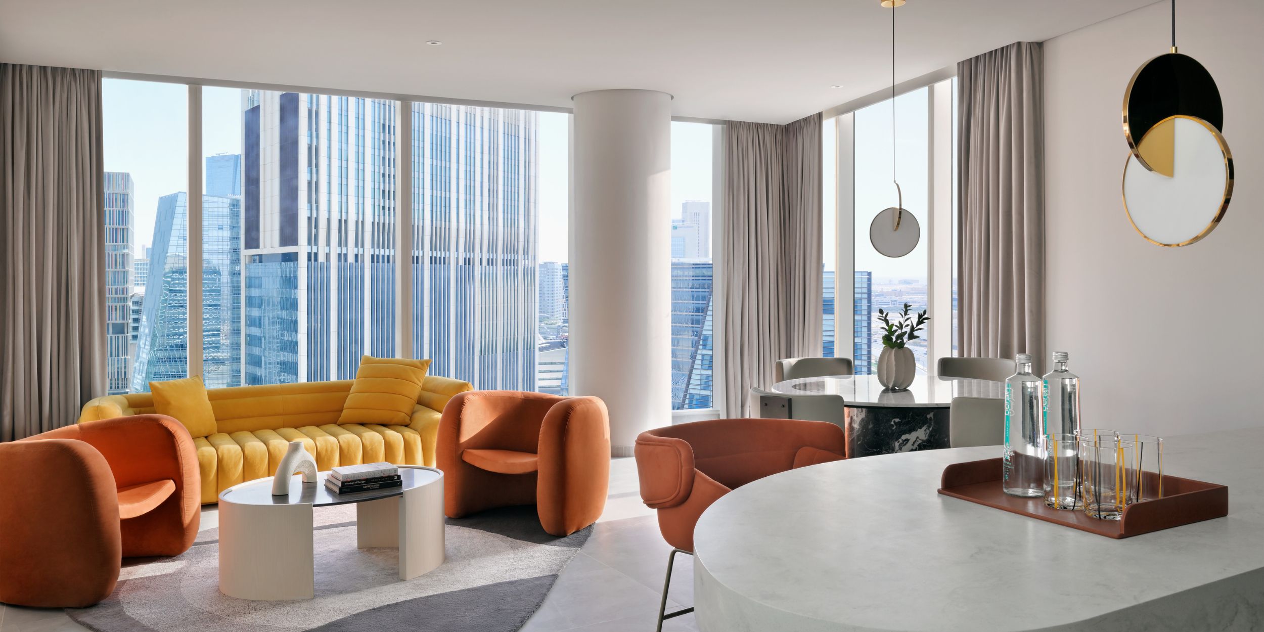 Living room with city view at Kimpton KAFD Riyadh