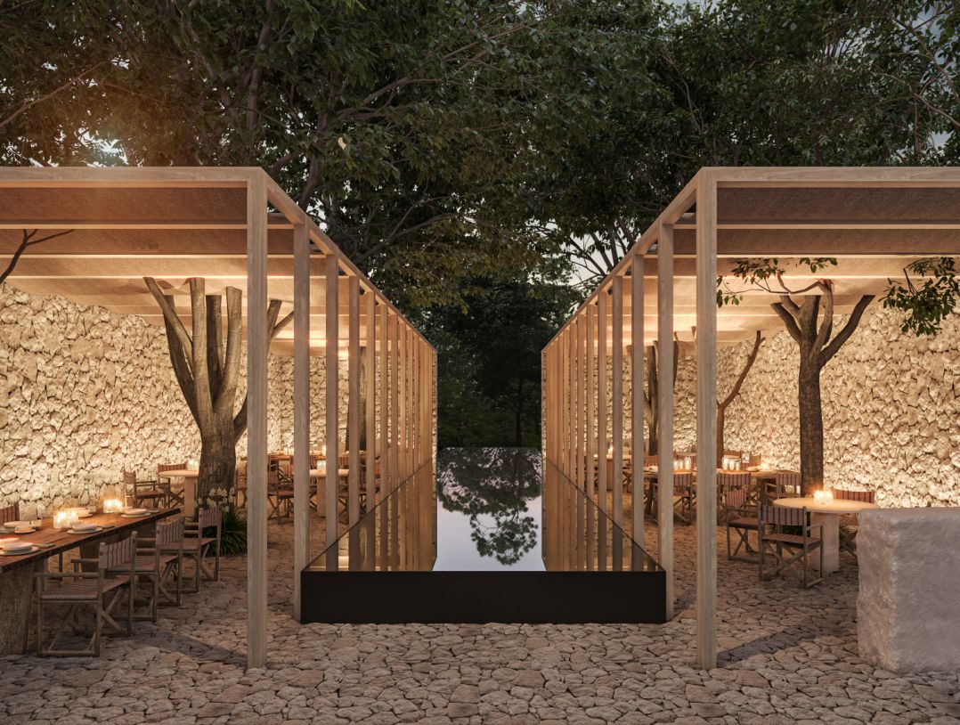 outdoor dining venue with candlelit tables and stone facade