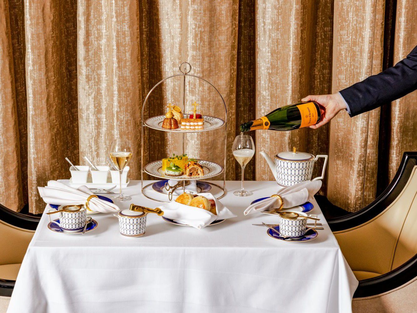 Small delights for afternoon tea with tea and champagne
