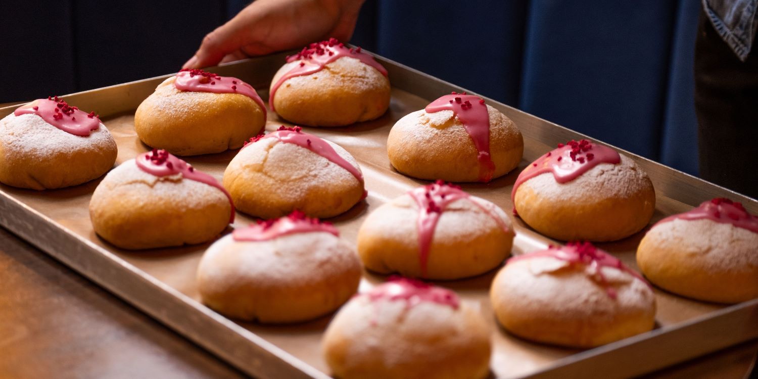 A tray of baked Kimpton buns
