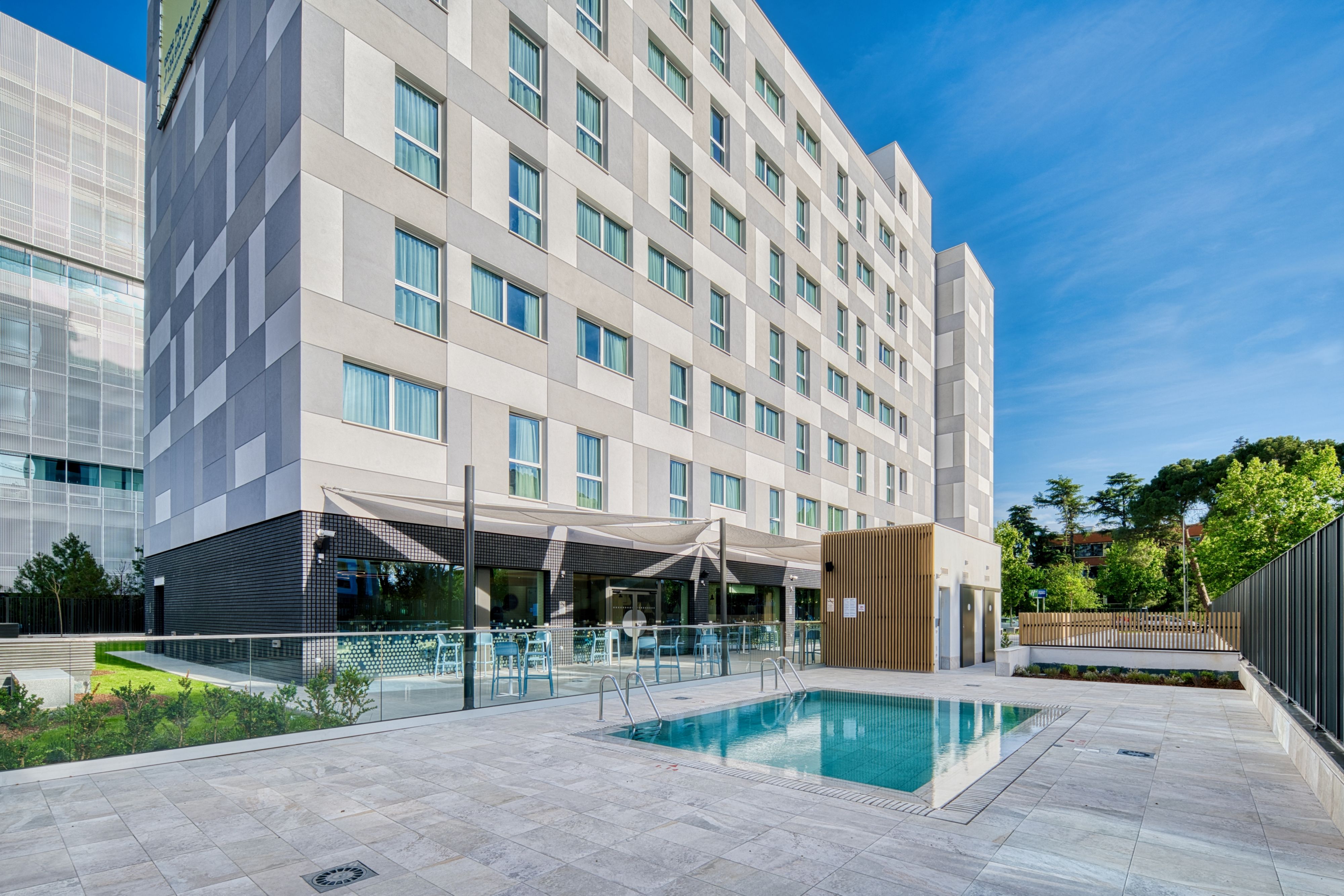 Hotel pool with solar thermal or heat pump pool heating