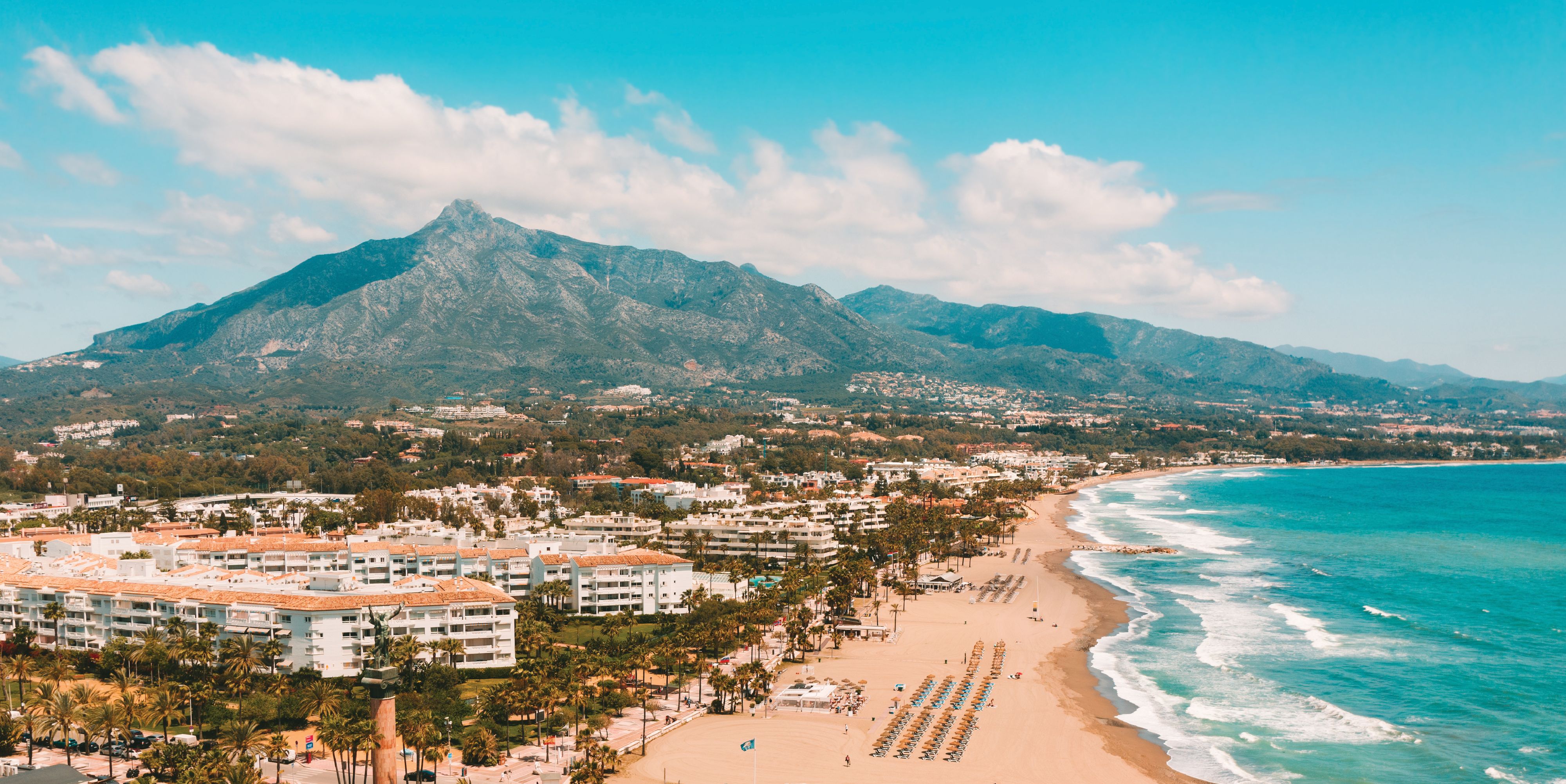 marbella spain coastline with blue waters and sky