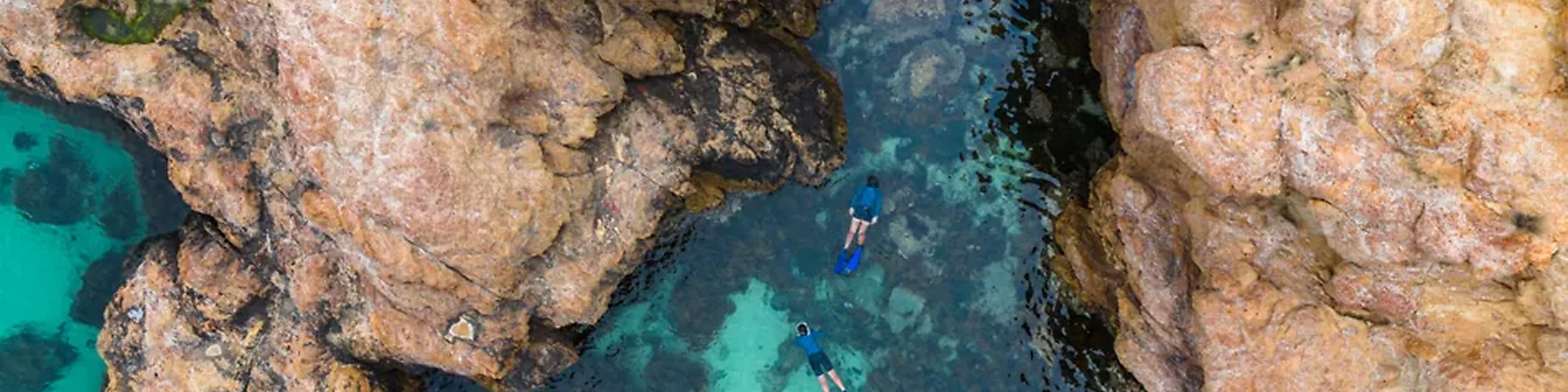 Image of IHG One Rewards woman surfing with IHG One Rewards logo