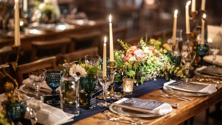 Elegant candlelit dining with floral décor
