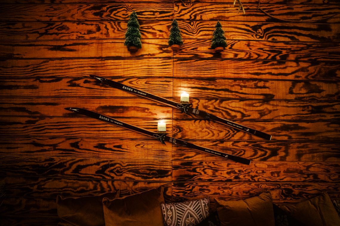 Mercy Me Winter Chalet skis on wall