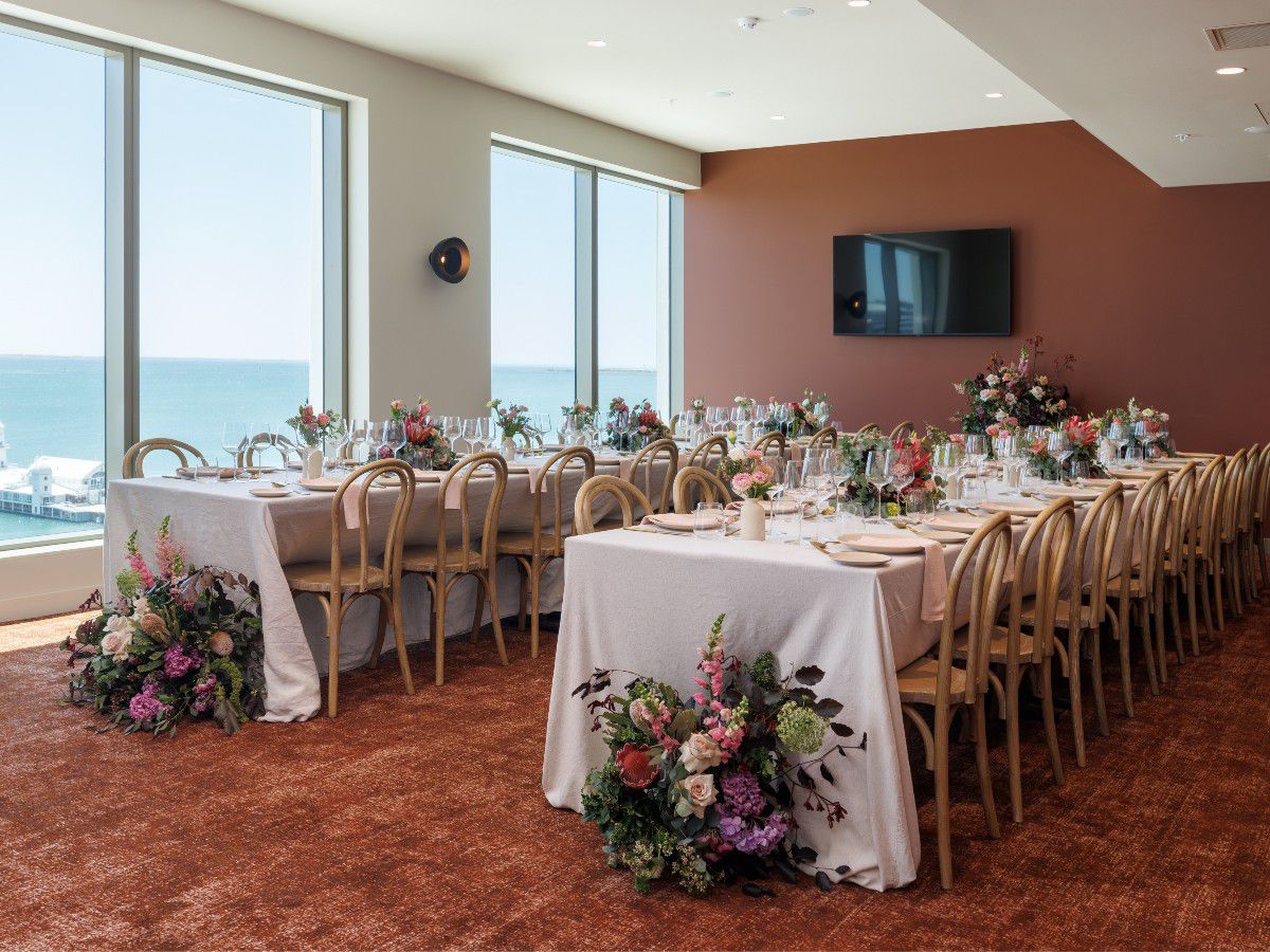 Elegant micro-wedding reception with ocean views.