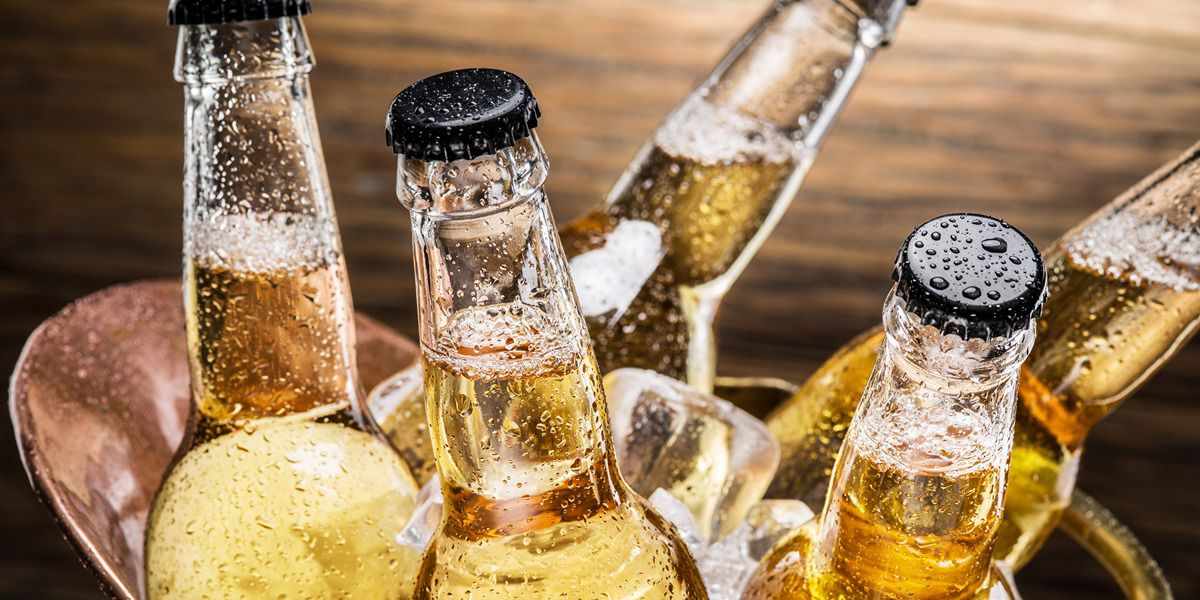 Chilled beer bottles with condensation on glass
