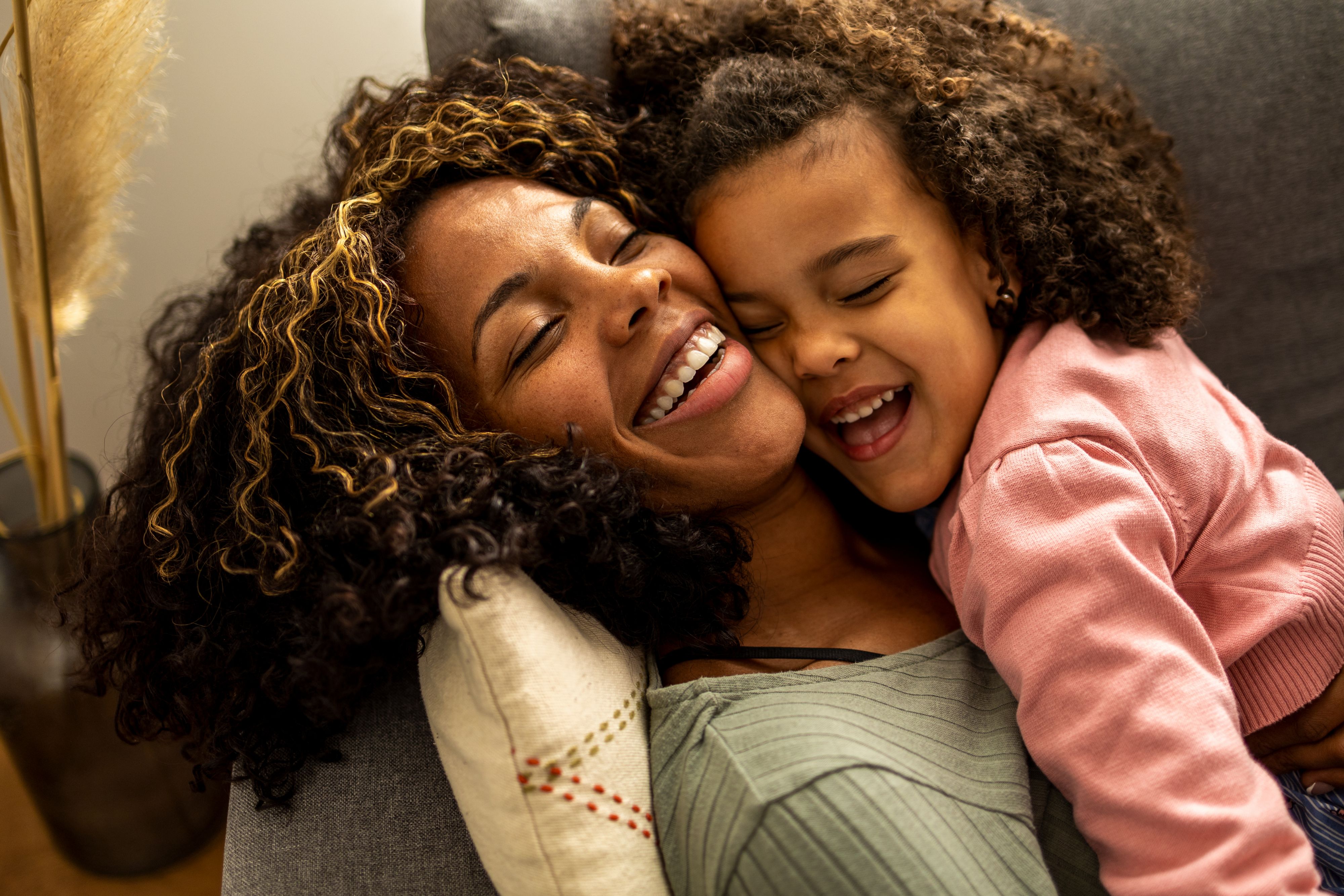 Colorful spring brunch table with pastries, fruit, quiche, and drinks.