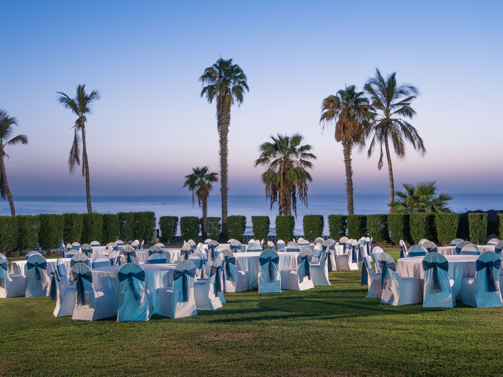 Create unforgettable outdoor celebrations surrounded by breathtaking seaside views