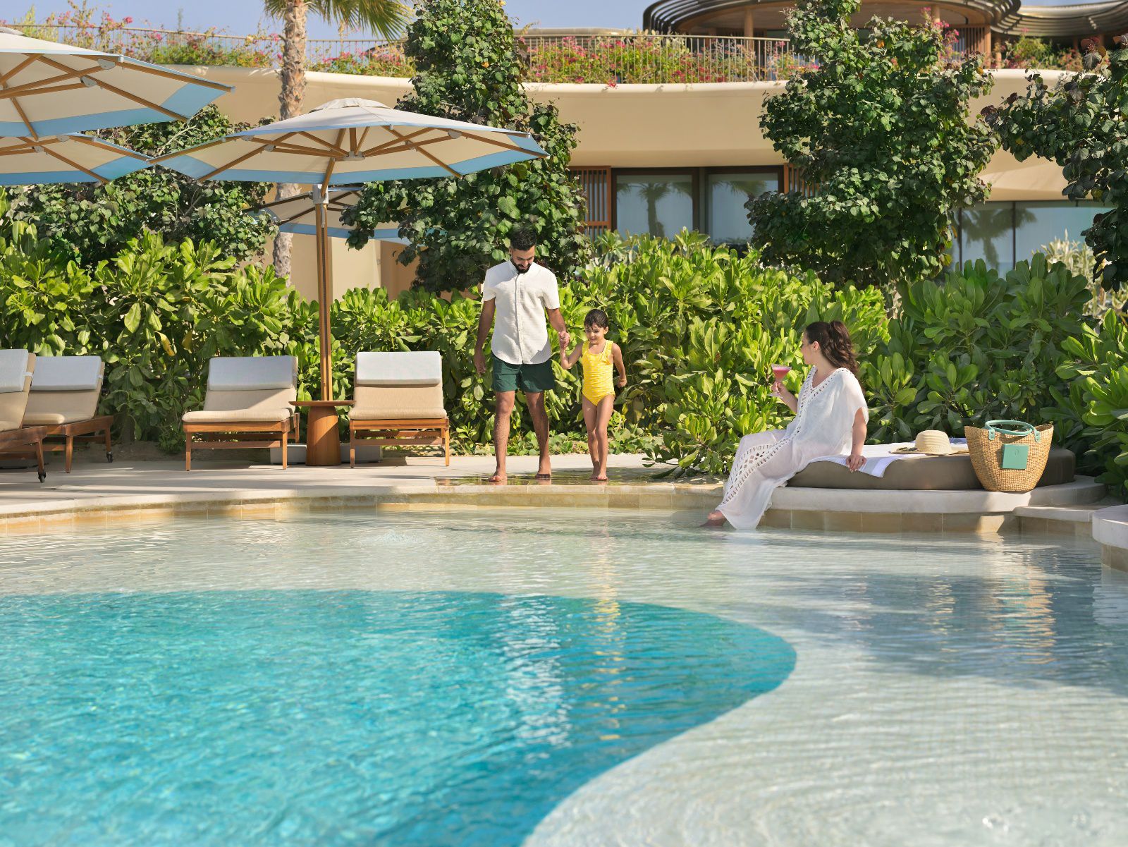 Spend sun-filled days between serene pools and a private beach escape.