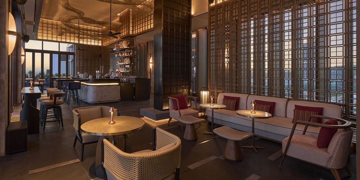 Elegant rooftop bar lounge with warm ambient lighting