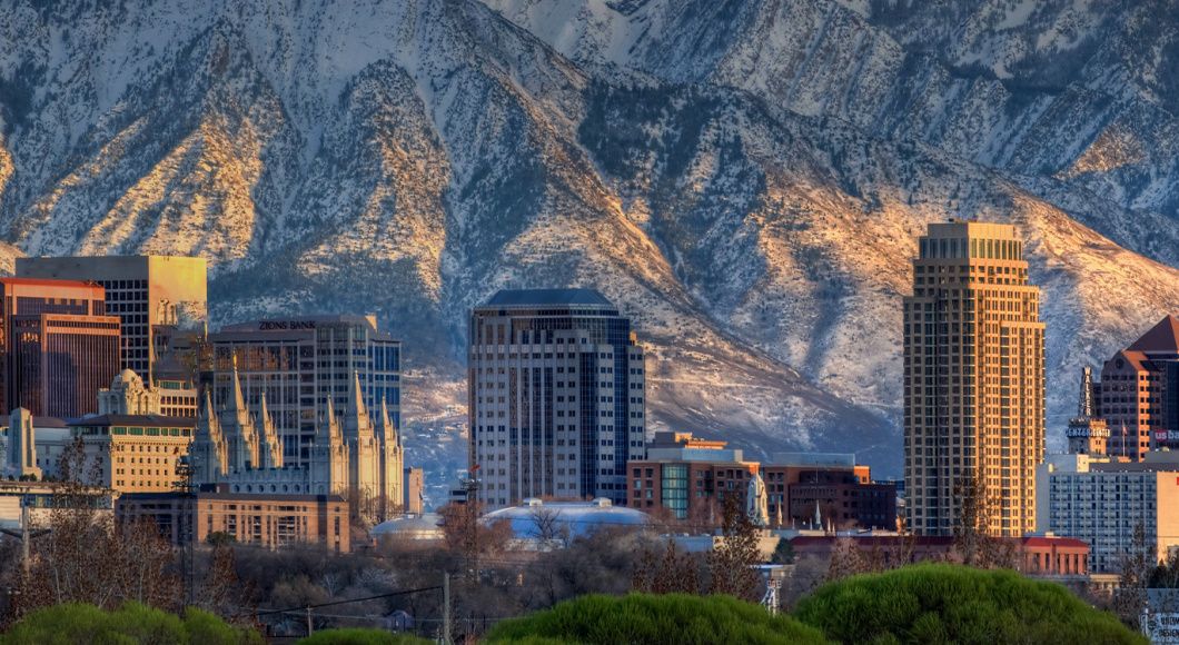 Salt Lake City's skyline nestled in the mountains of Utah