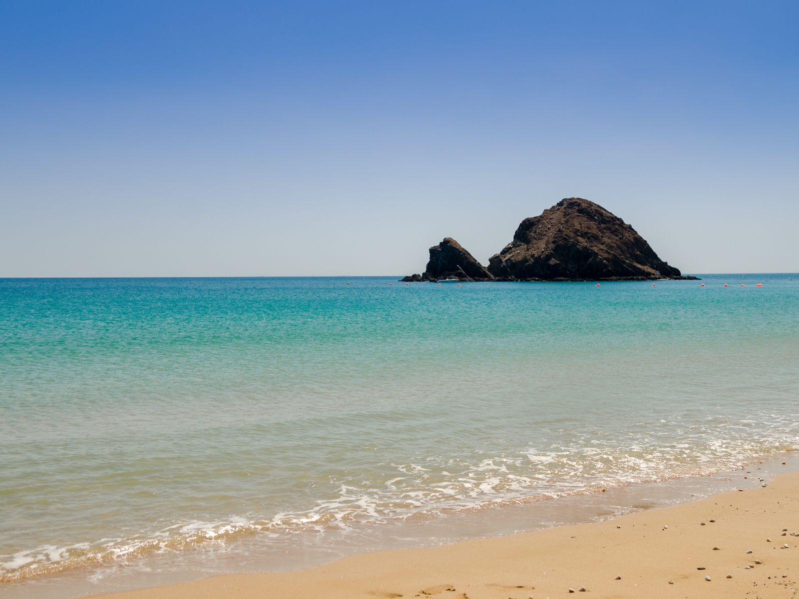 Snoopy Island with turquoise waters