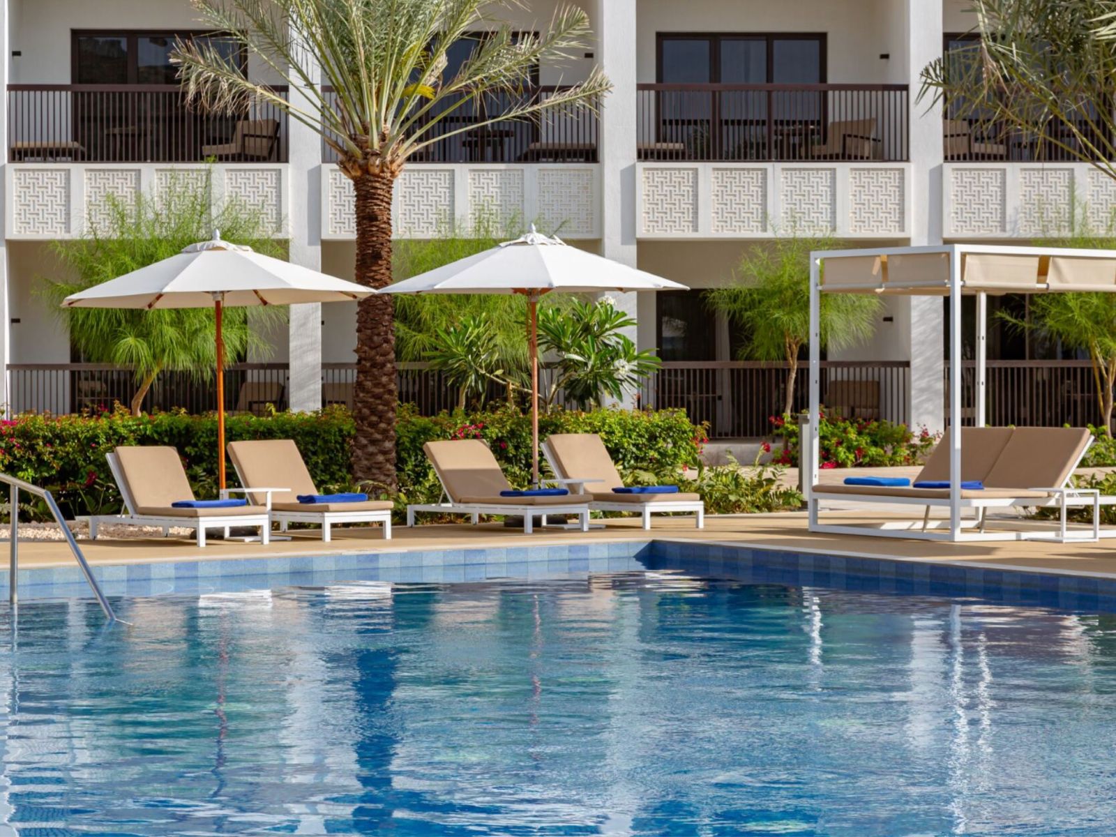 Luxury poolside with sun loungers