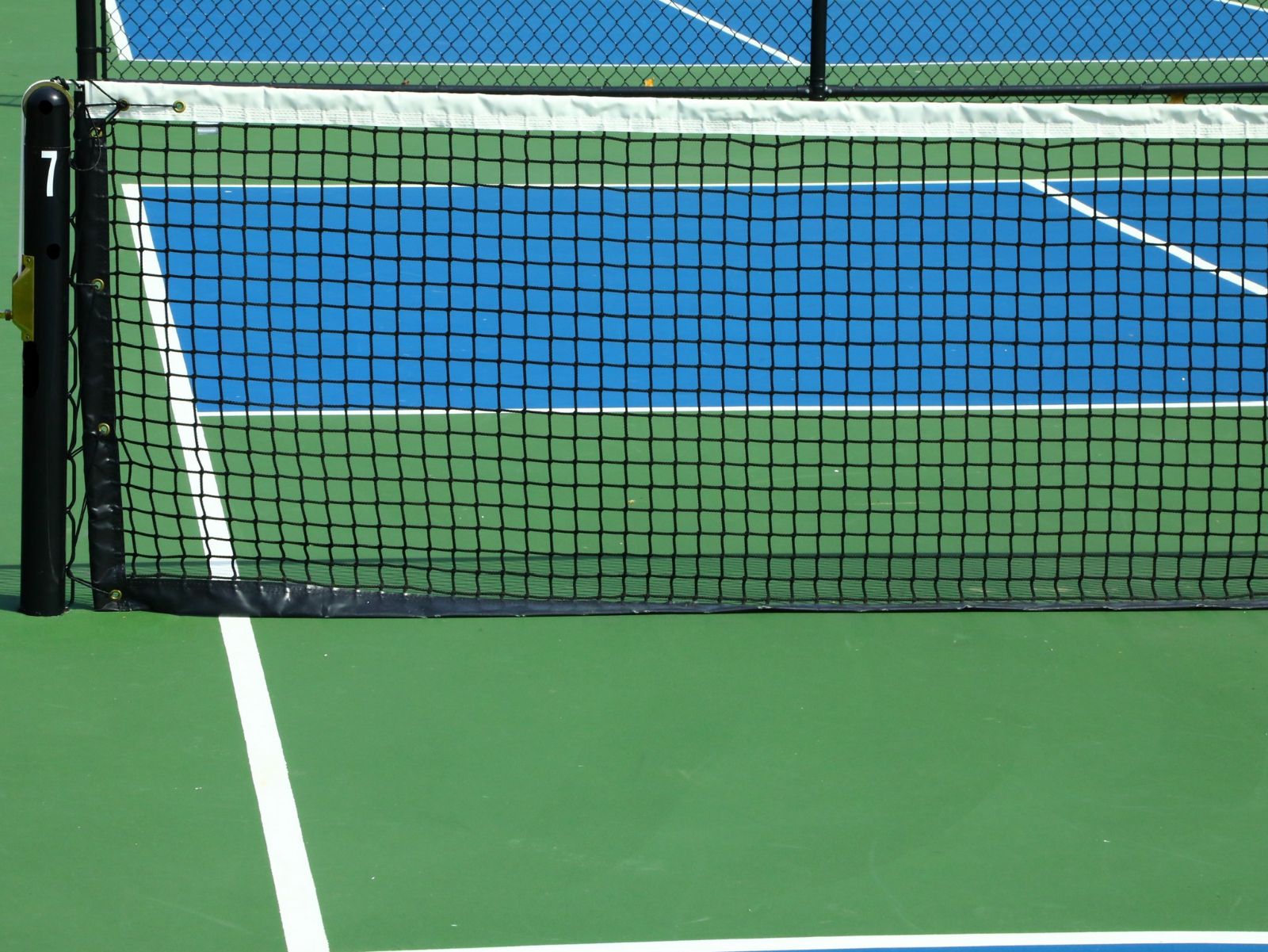 Professional tennis court with net