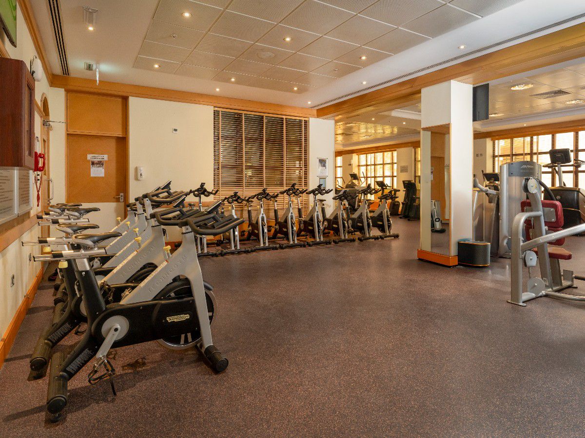 Modern fitness center with cardio and strength equipment