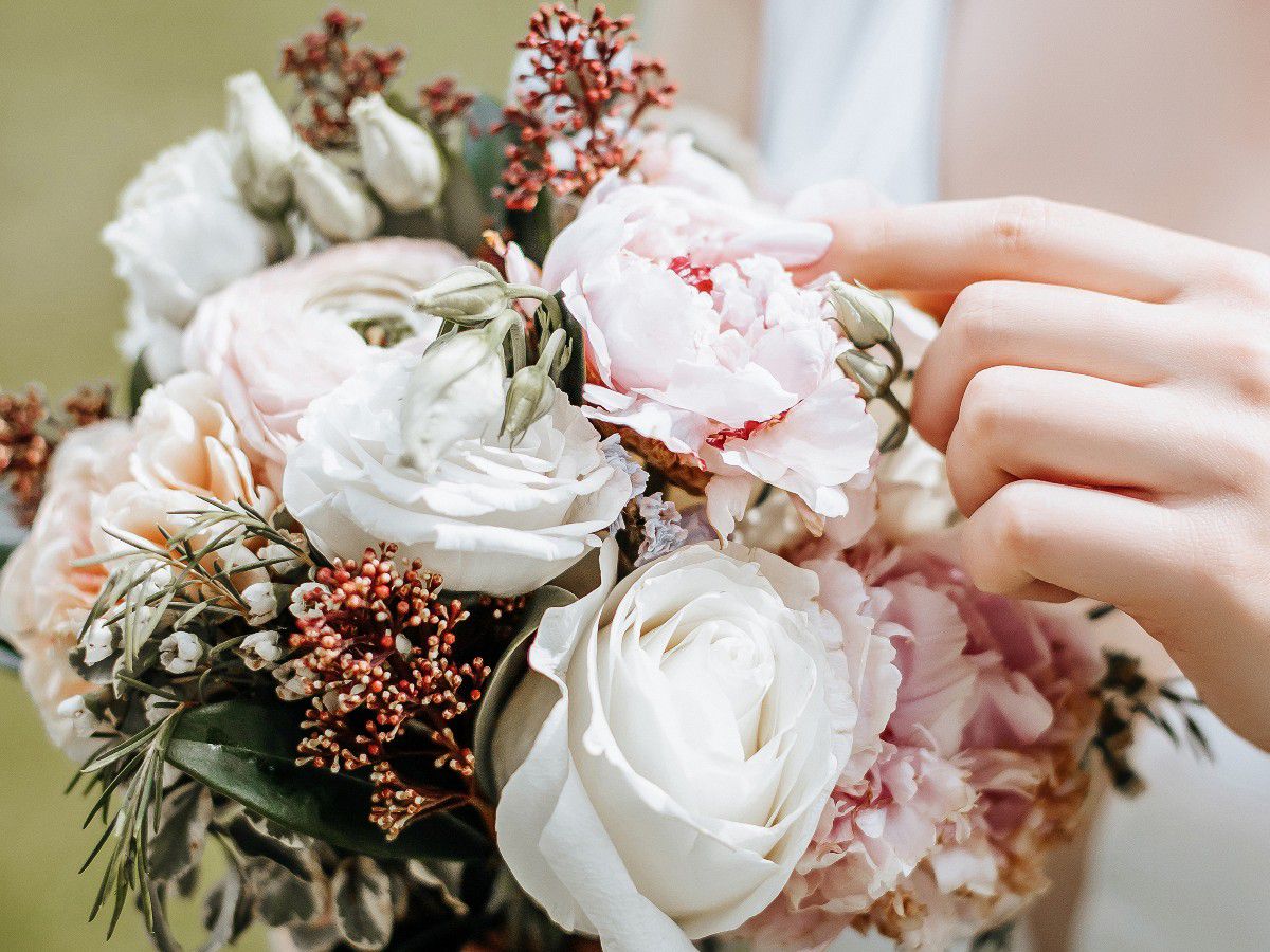 Close-up of a delicate floral bouquet with soft pastel blooms.