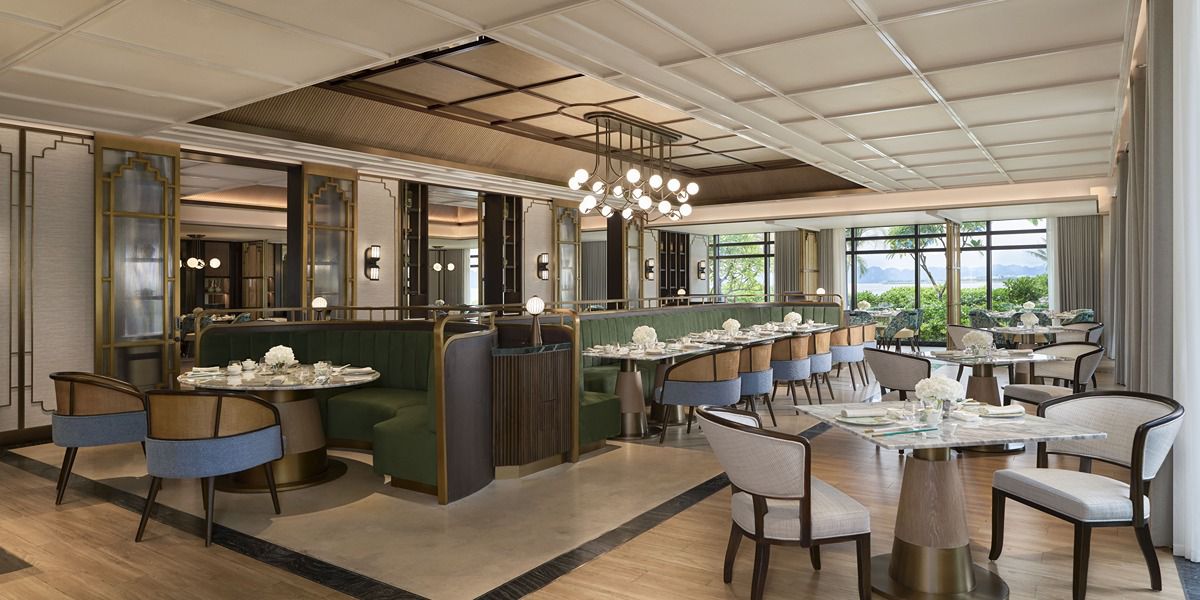 Elegant contemporary dining room with spacious seating and greenery