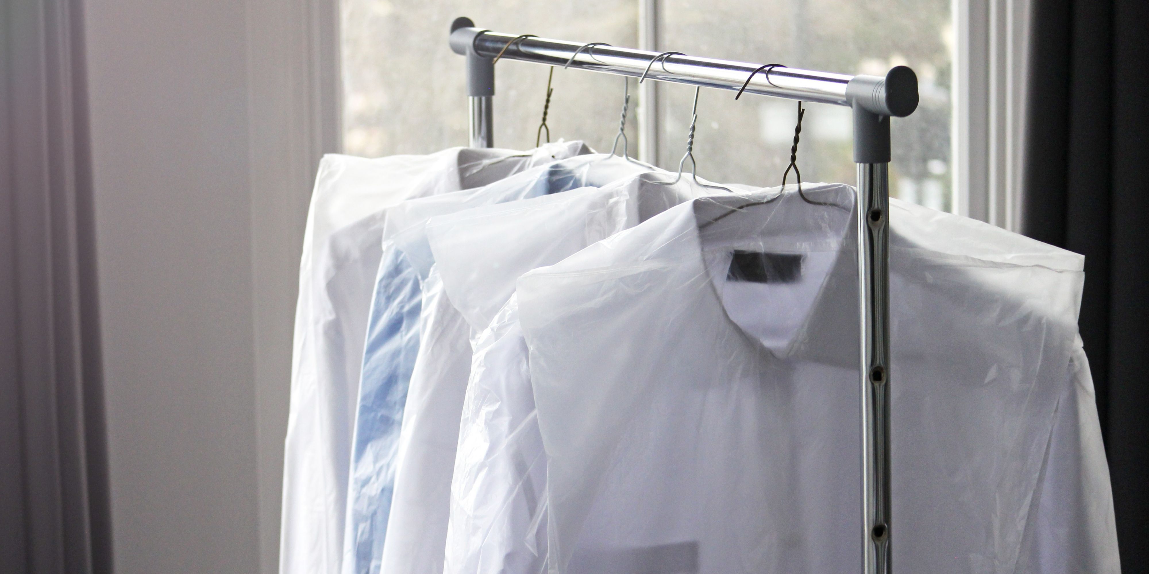 dry cleaned clothes on a hanger