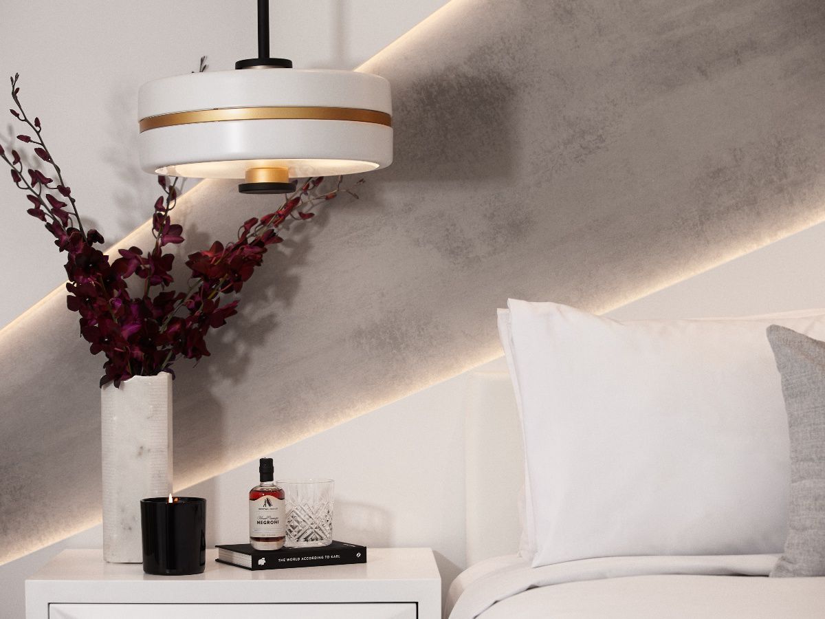Modern bedroom with lamp and flowers